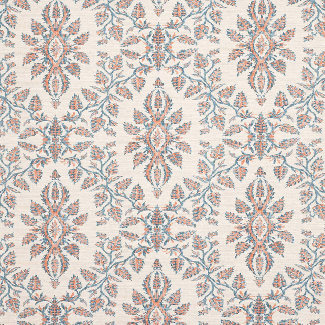Ivory fabric swatch with large navy and red floral damask pattern
