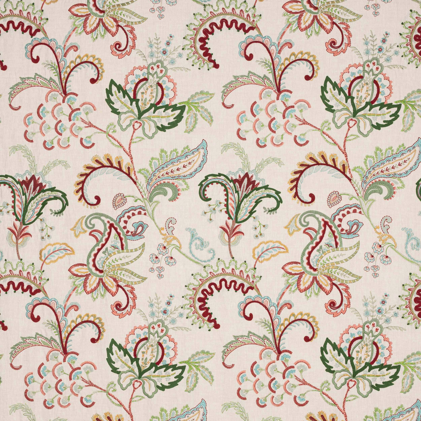 Pale ground fabric with large red and green scrolling floral motifs
