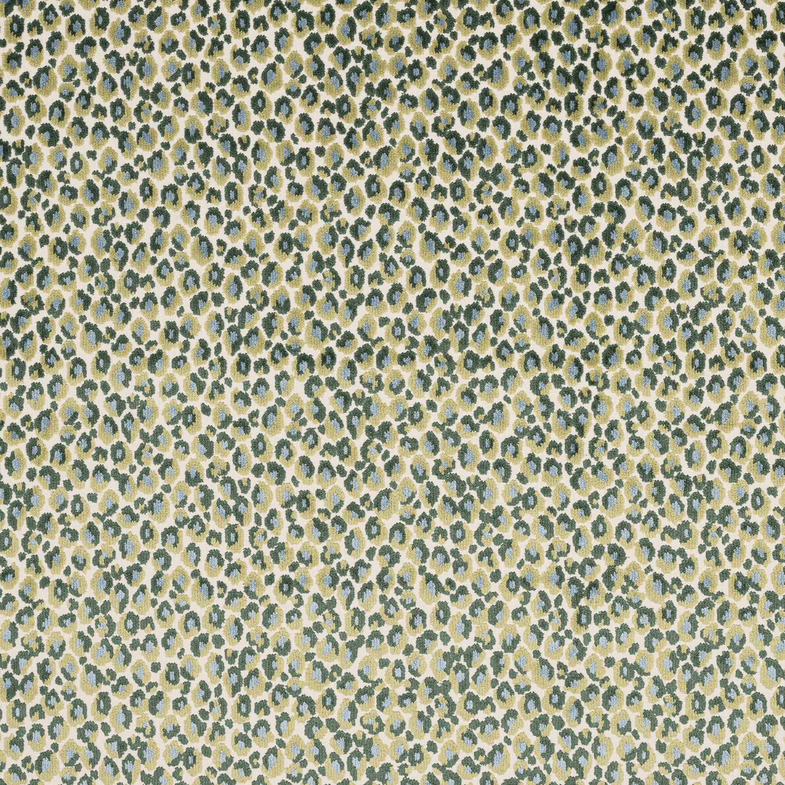 Close-up of small green and gold animal print on a light ground