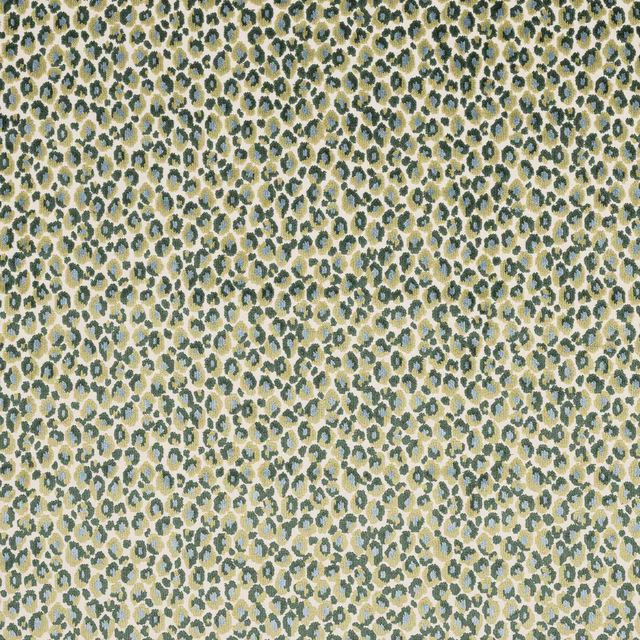 Close-up of small green and gold animal print on a light ground