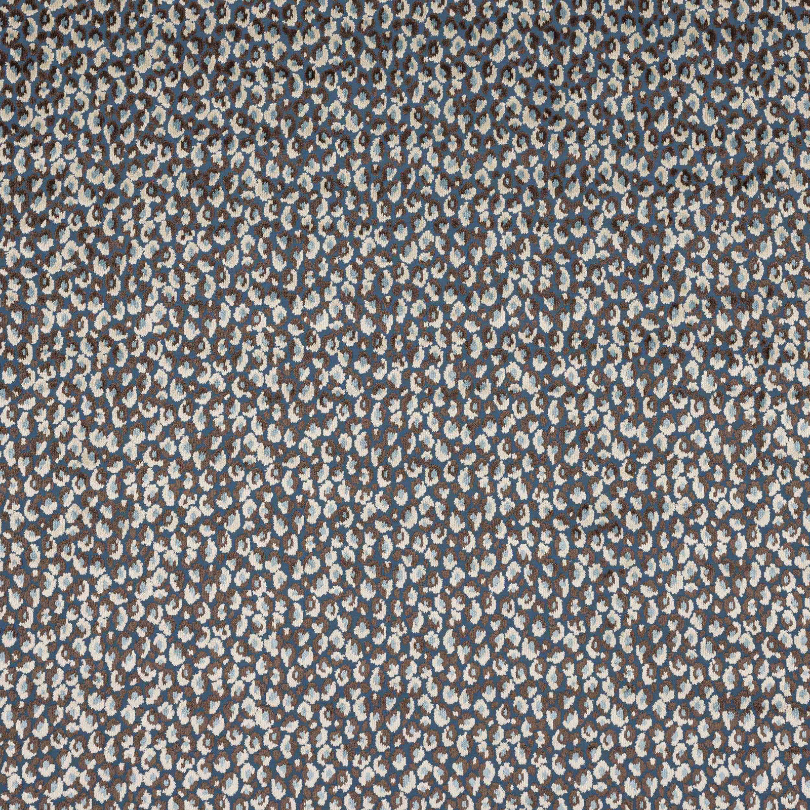 Close-up of Cleo Navy fabric with a small mottled navy-and-cream abstract weave