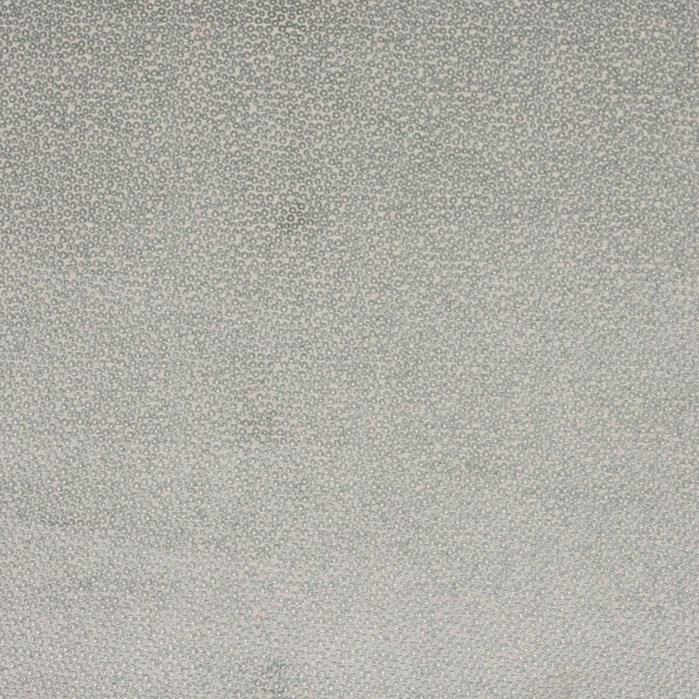Close-up of a pale aqua geometric woven fabric with tiny dotted repeat