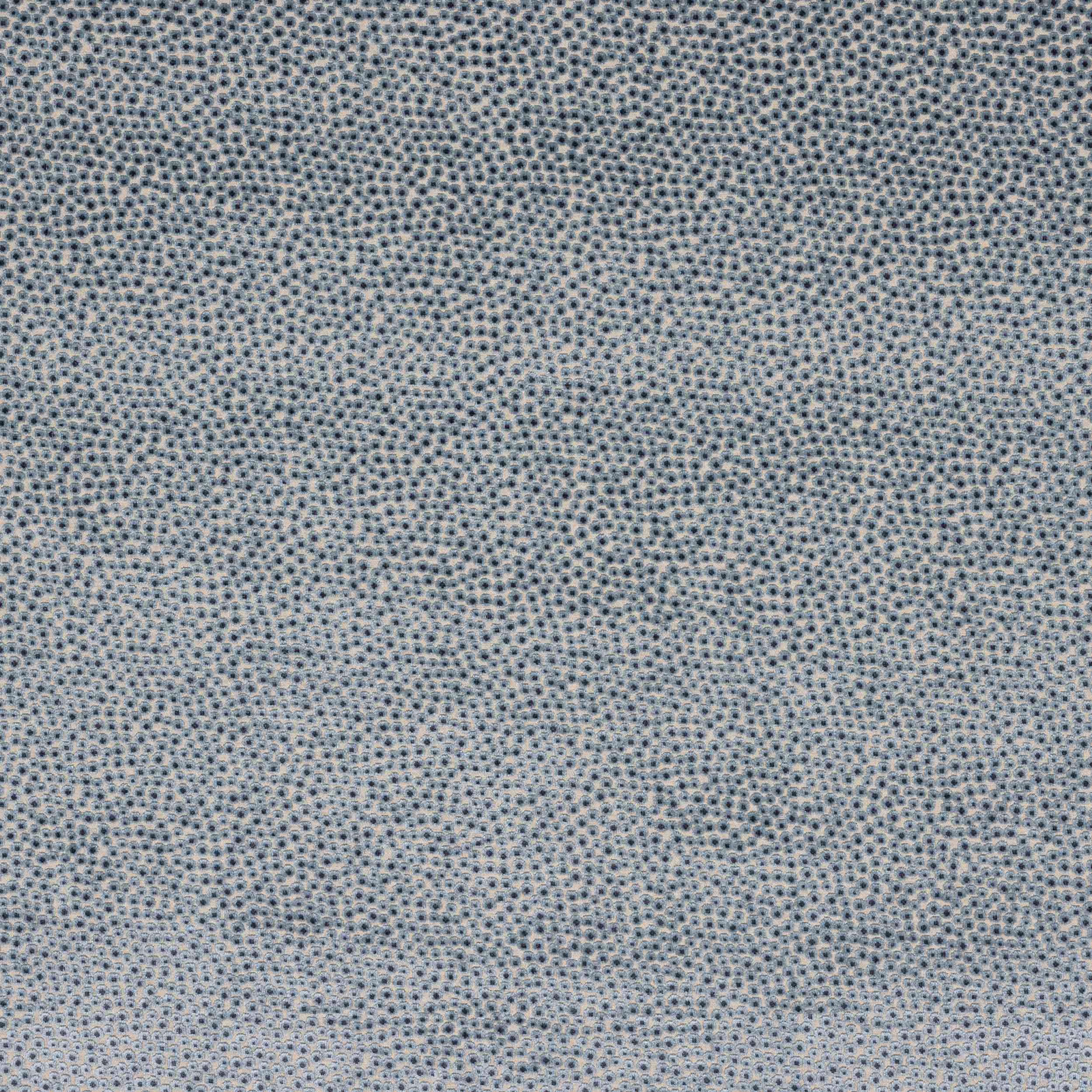 Close-up of soft powder-blue speckled woven fabric with fine textured dots