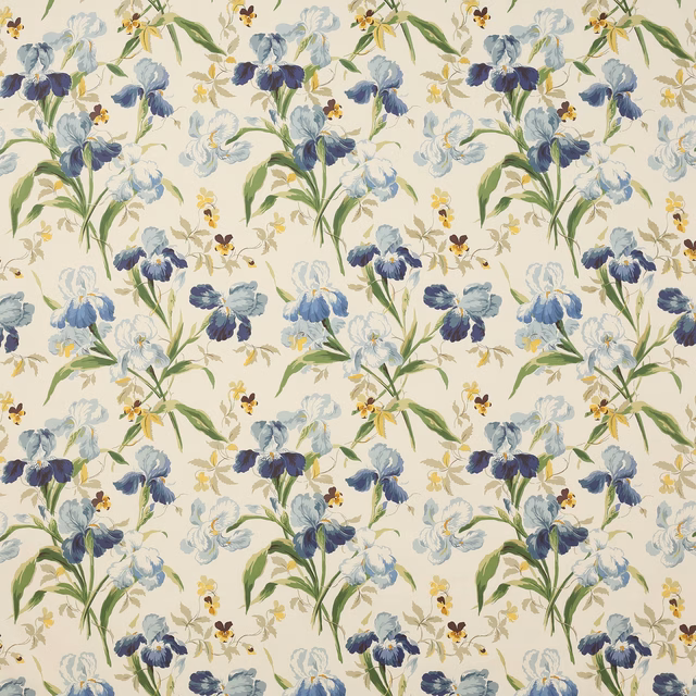Blue and green floral cotton fabric on a cream ground, with painterly stems