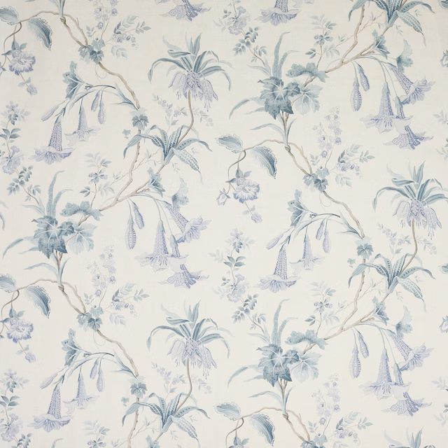 Pale blue floral linen with trailing bell-shaped blooms on an ivory ground