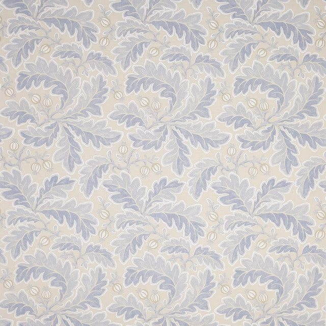 Pale blue damask linen swatch with ivory leaf motifs on a soft cream ground