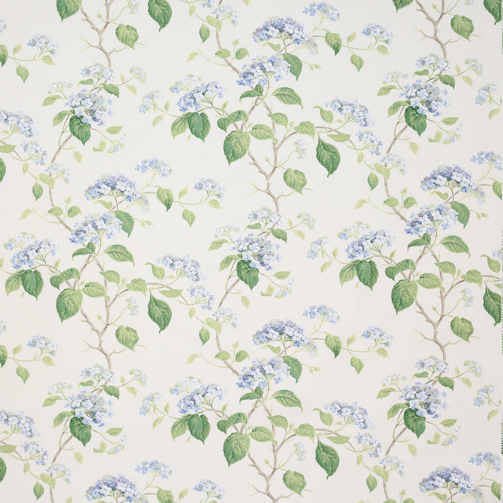 Blue and green floral cotton print with branching stems on an ivory ground