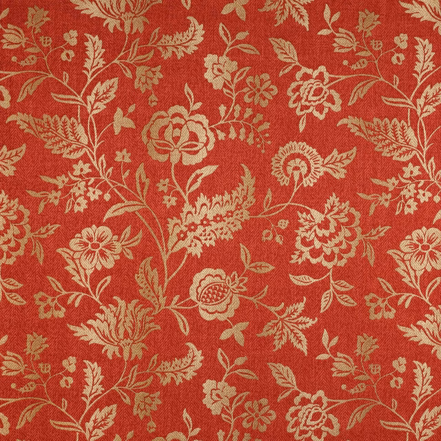 Close-up of a red floral woven fabric with pale gold trailing motifs