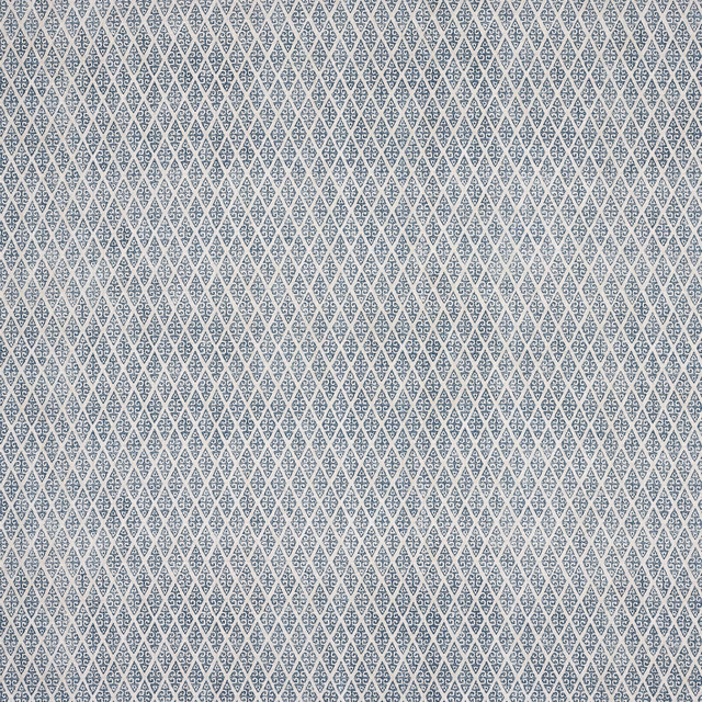 Small indigo blue geometric print on a pale ground, tightly repeating across the swatch