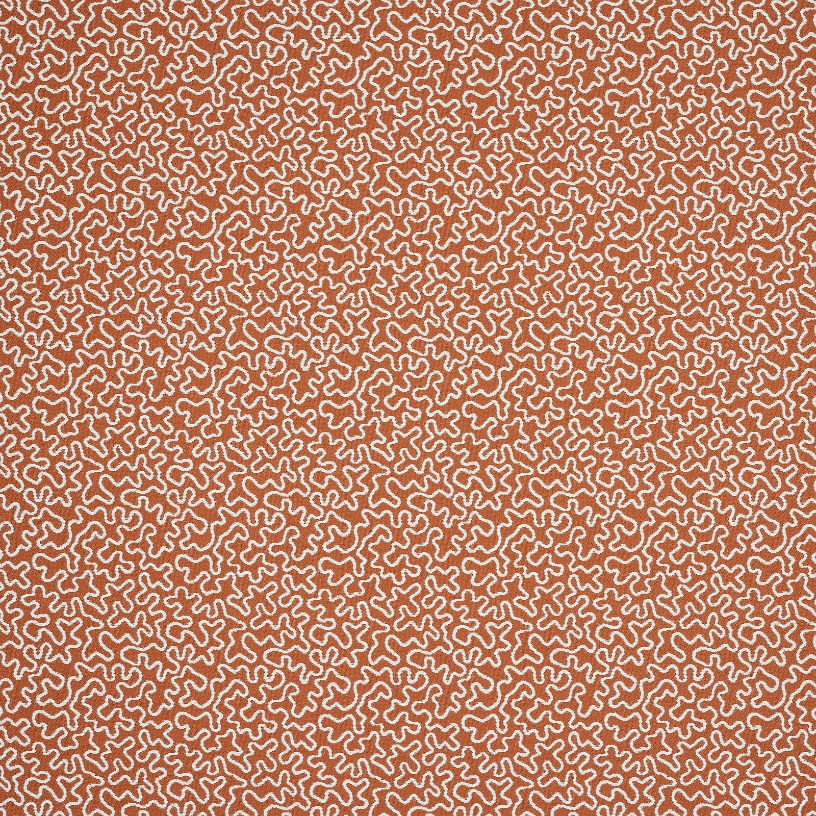 Terracotta abstract loop pattern with pale cream outlines on woven fabric