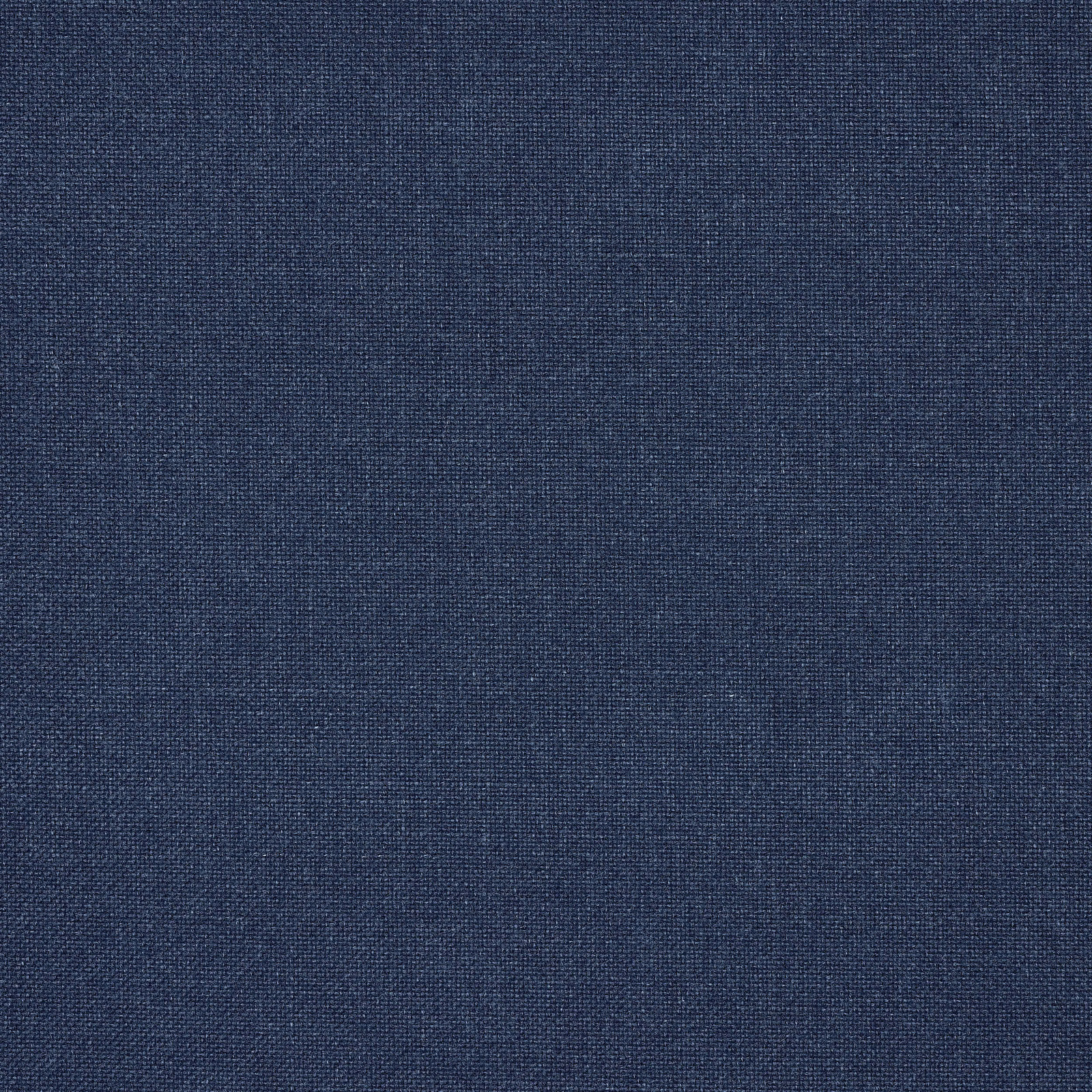 Close-up of a deep marine blue plain-woven fabric with a fine textured surface