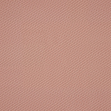 Close-up of paprika red geometric woven fabric with tiny diagonal checks