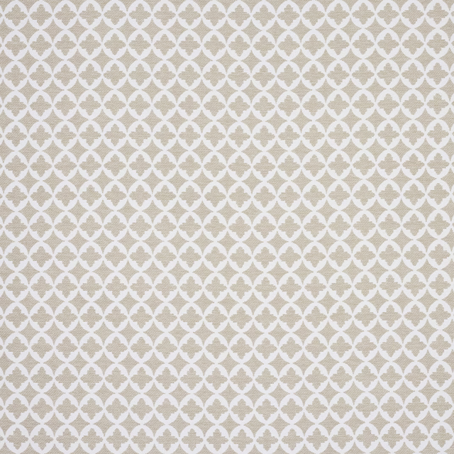 Close-up of a small ivory and beige geometric woven fabric with repeating quatrefoil shapes