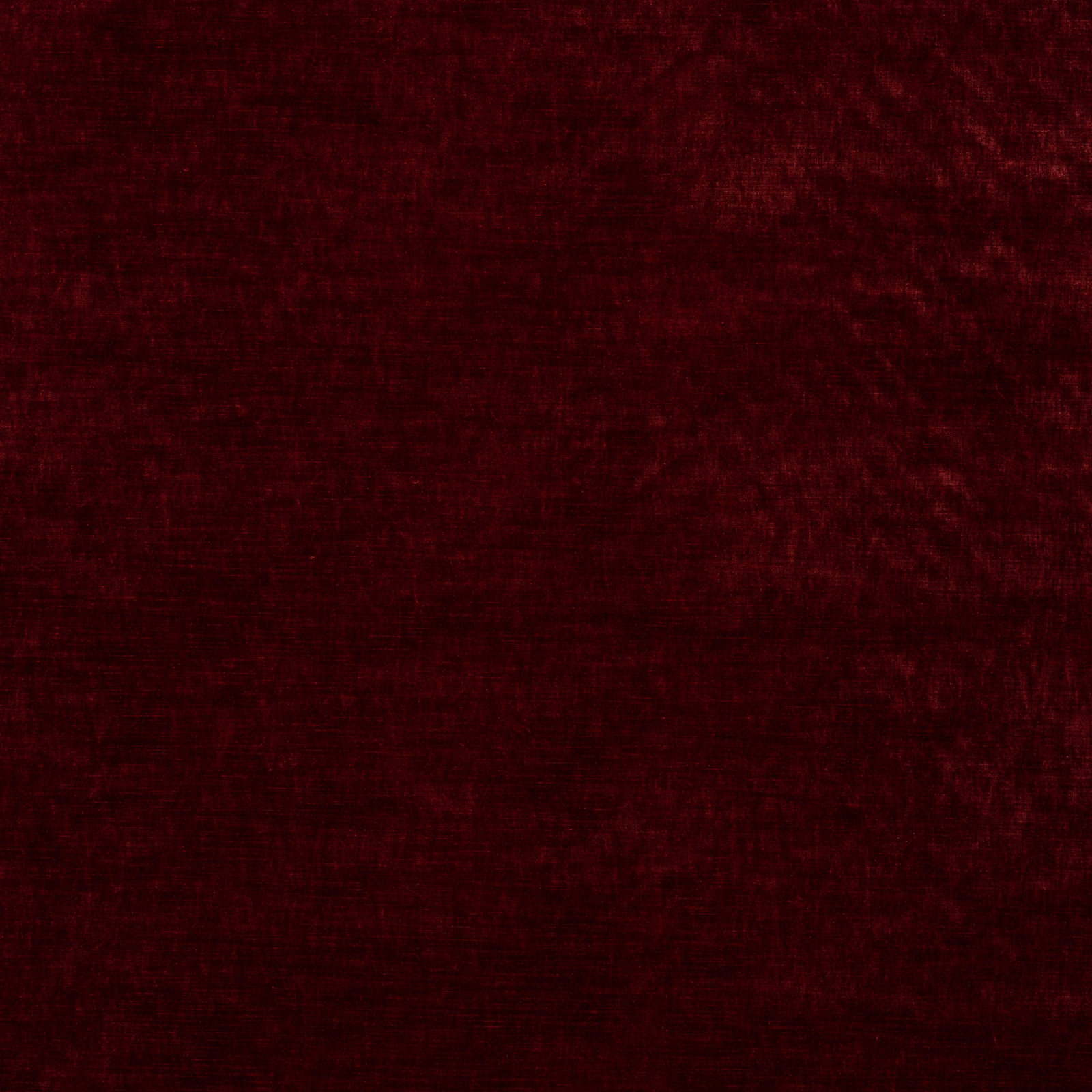 Deep antique red velvet swatch with a soft, shadowed pile texture