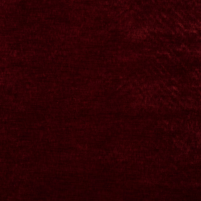 Deep antique red velvet swatch with a soft, shadowed pile texture
