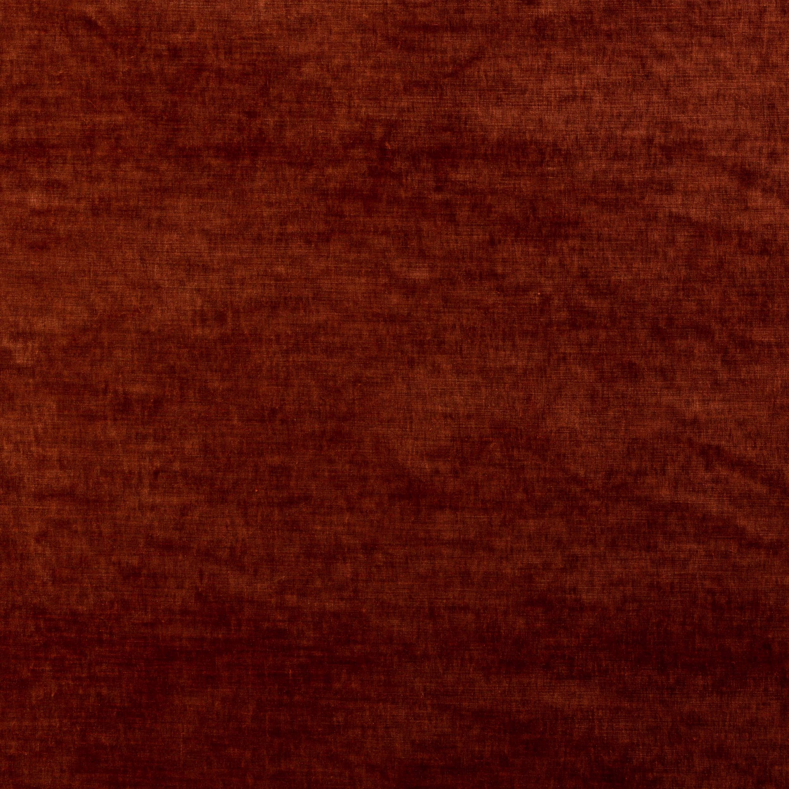 Deep brick red velvet swatch with softly mottled pile and dark russet shading