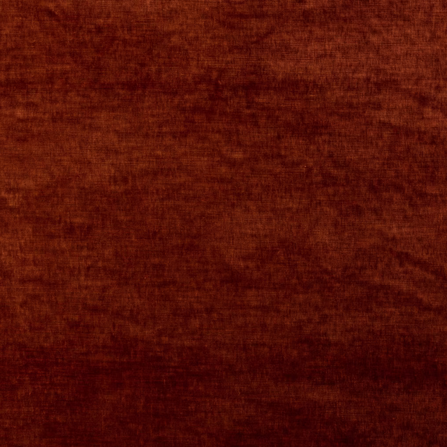 Deep brick red velvet swatch with softly mottled pile and dark russet shading