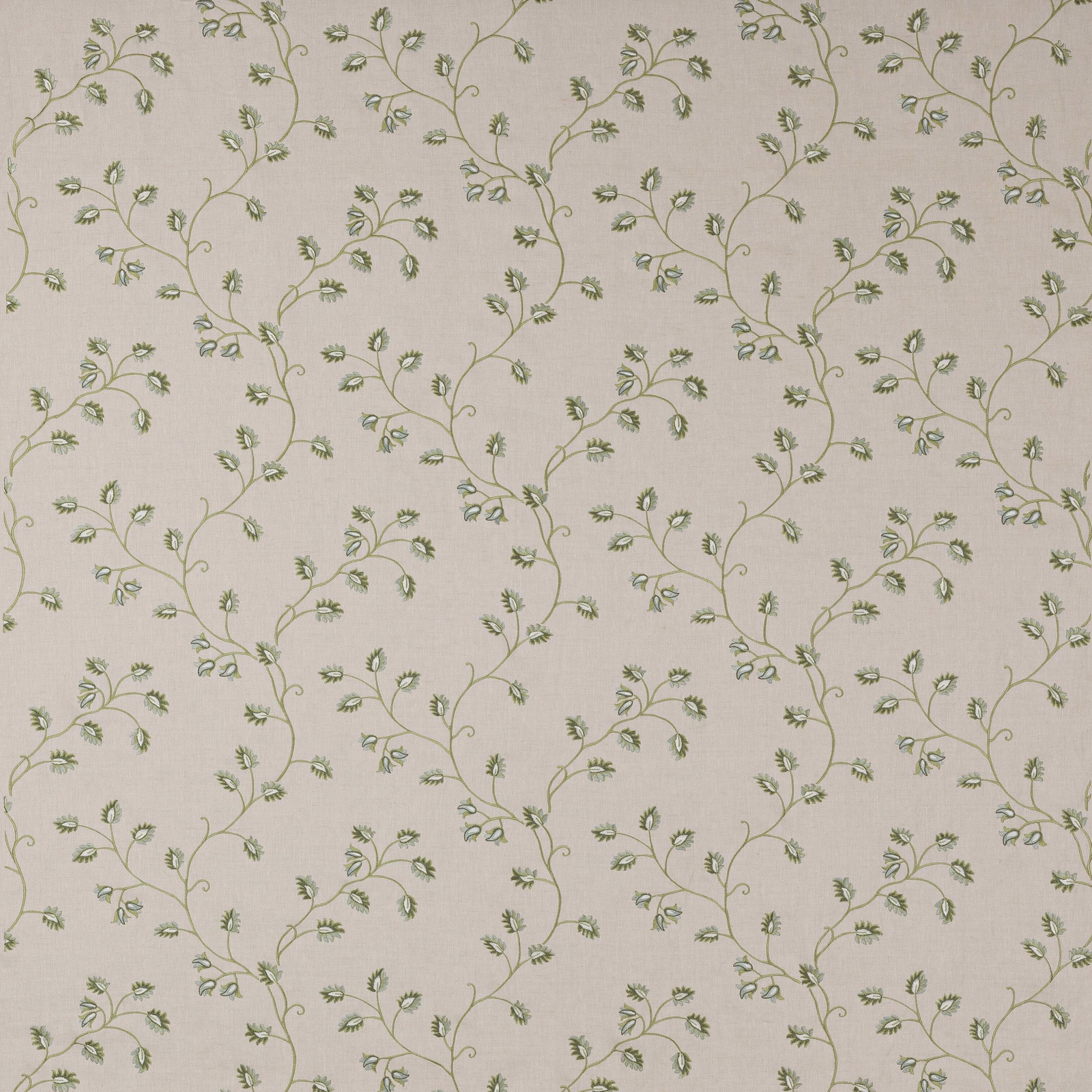 Pale ground fabric with trailing leaf-green vine and small botanical sprigs