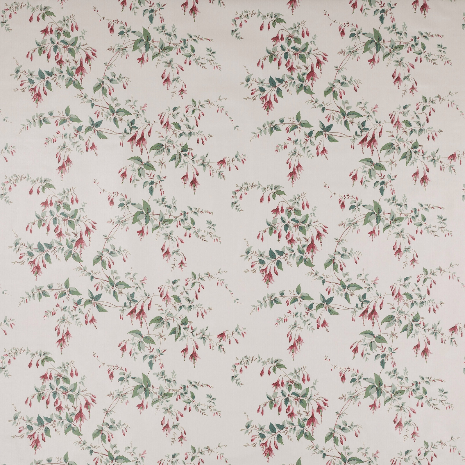 Cream cotton fabric with scattered fuchsia and green floral sprigs