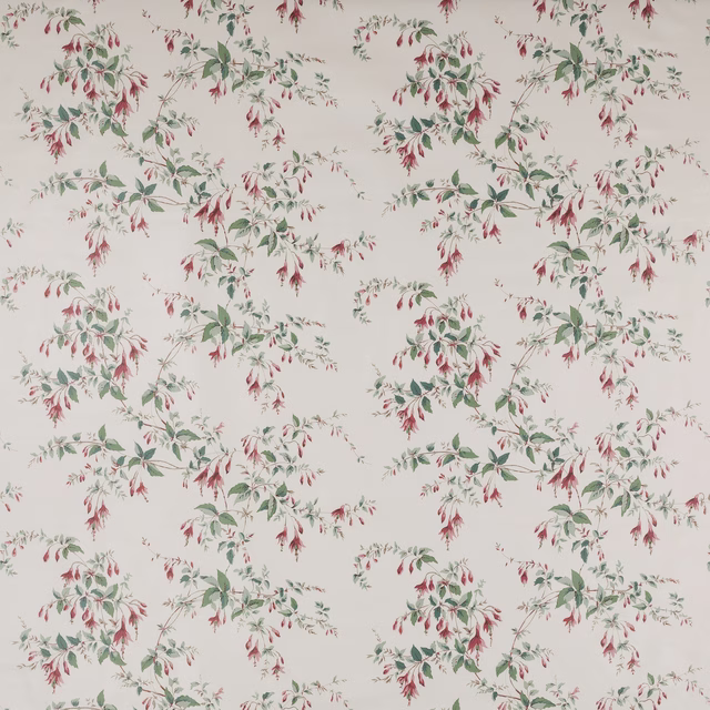 Cream cotton fabric with scattered fuchsia and green floral sprigs
