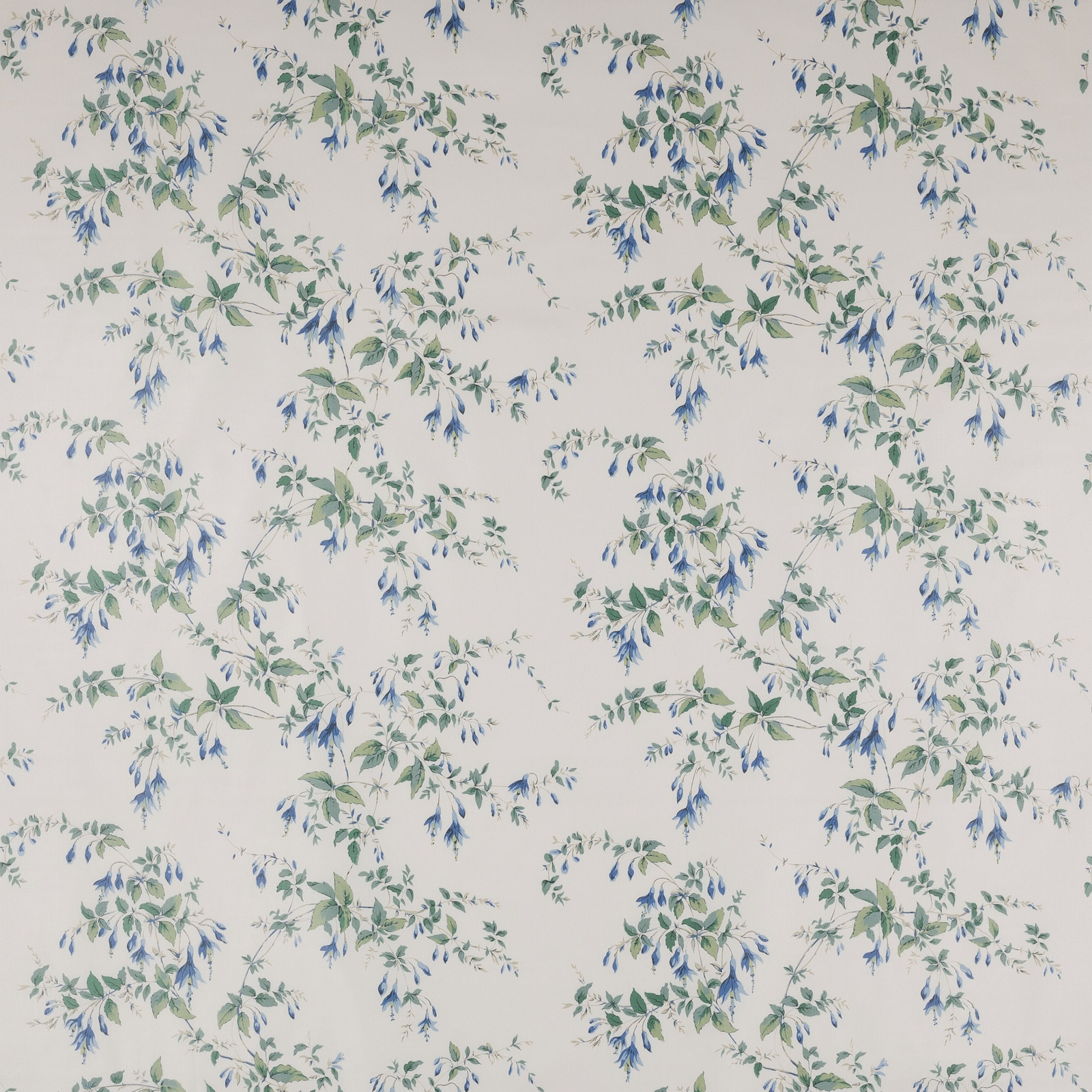 Pale ground cotton fabric with scattered blue and green floral sprigs