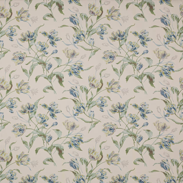 Pale floral cotton with blue-green blossoms and trailing green stems on ivory