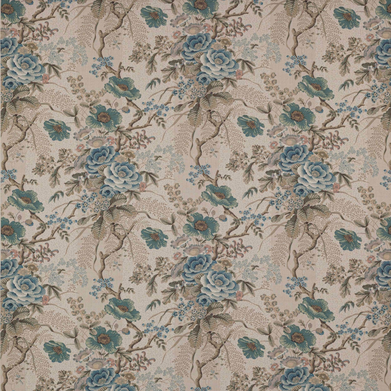 Blue floral linen swatch with trailing branches on a stone ground
