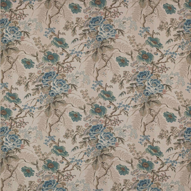 Blue floral linen swatch with trailing branches on a stone ground
