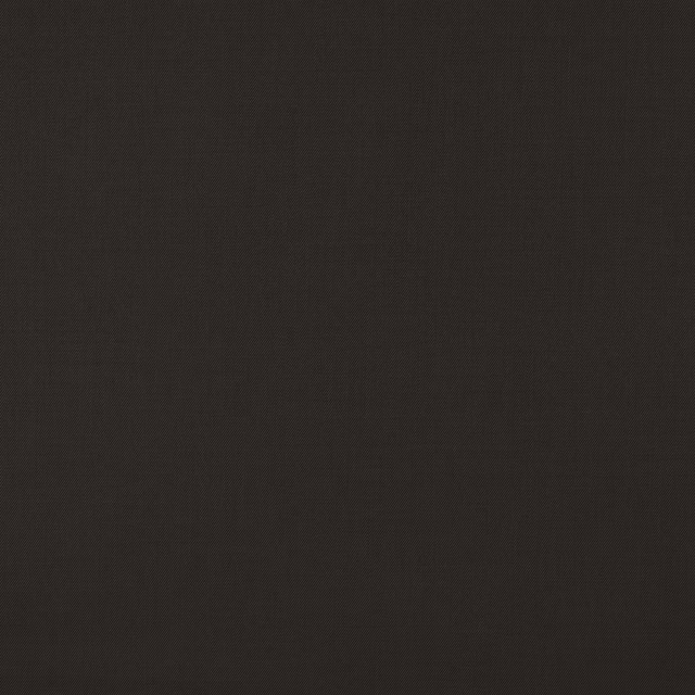 Close-up of deep charcoal wool twill fabric with fine diagonal texture