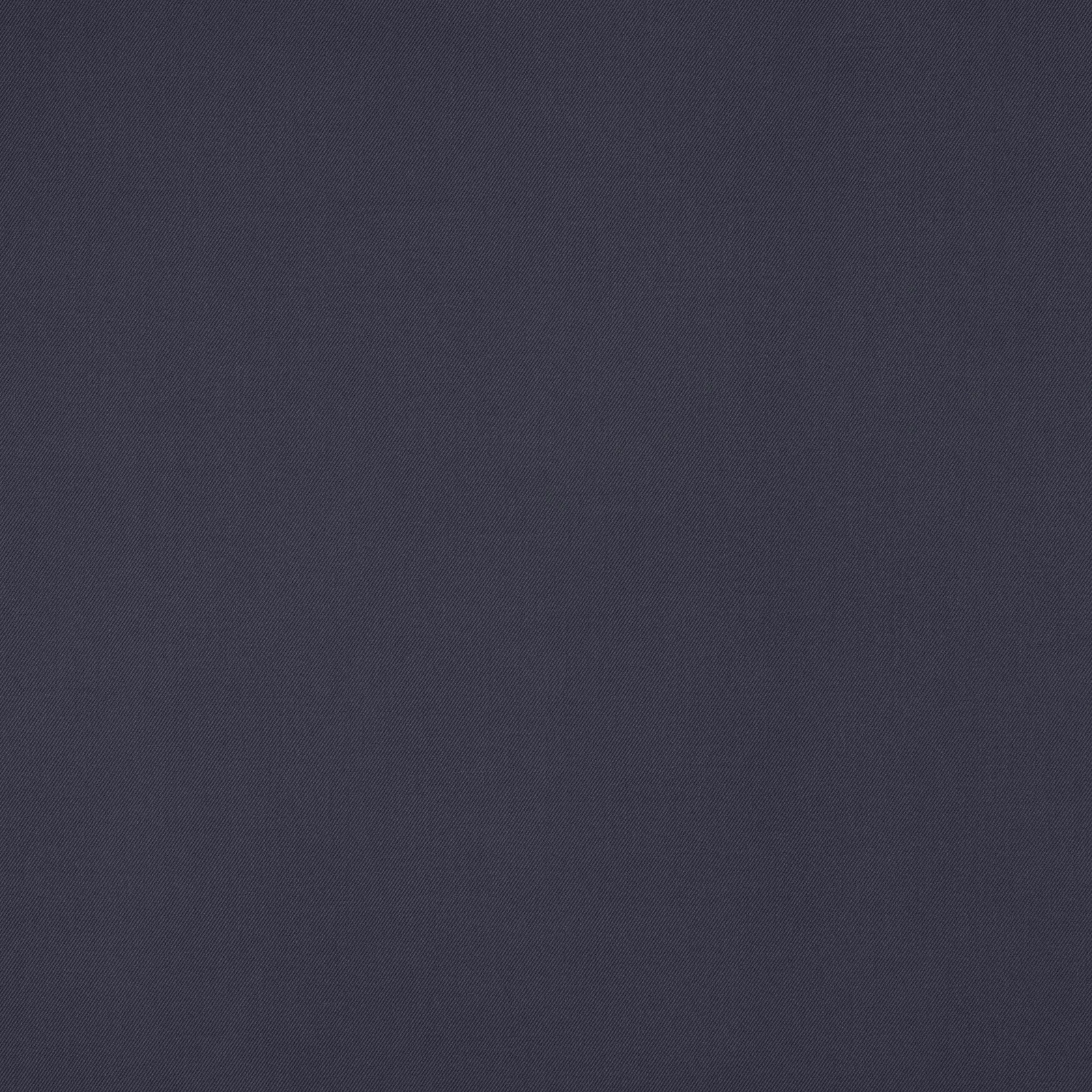Close-up of deep midnight blue wool fabric with fine diagonal weave