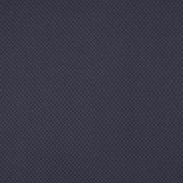Close-up of deep midnight blue wool fabric with fine diagonal weave