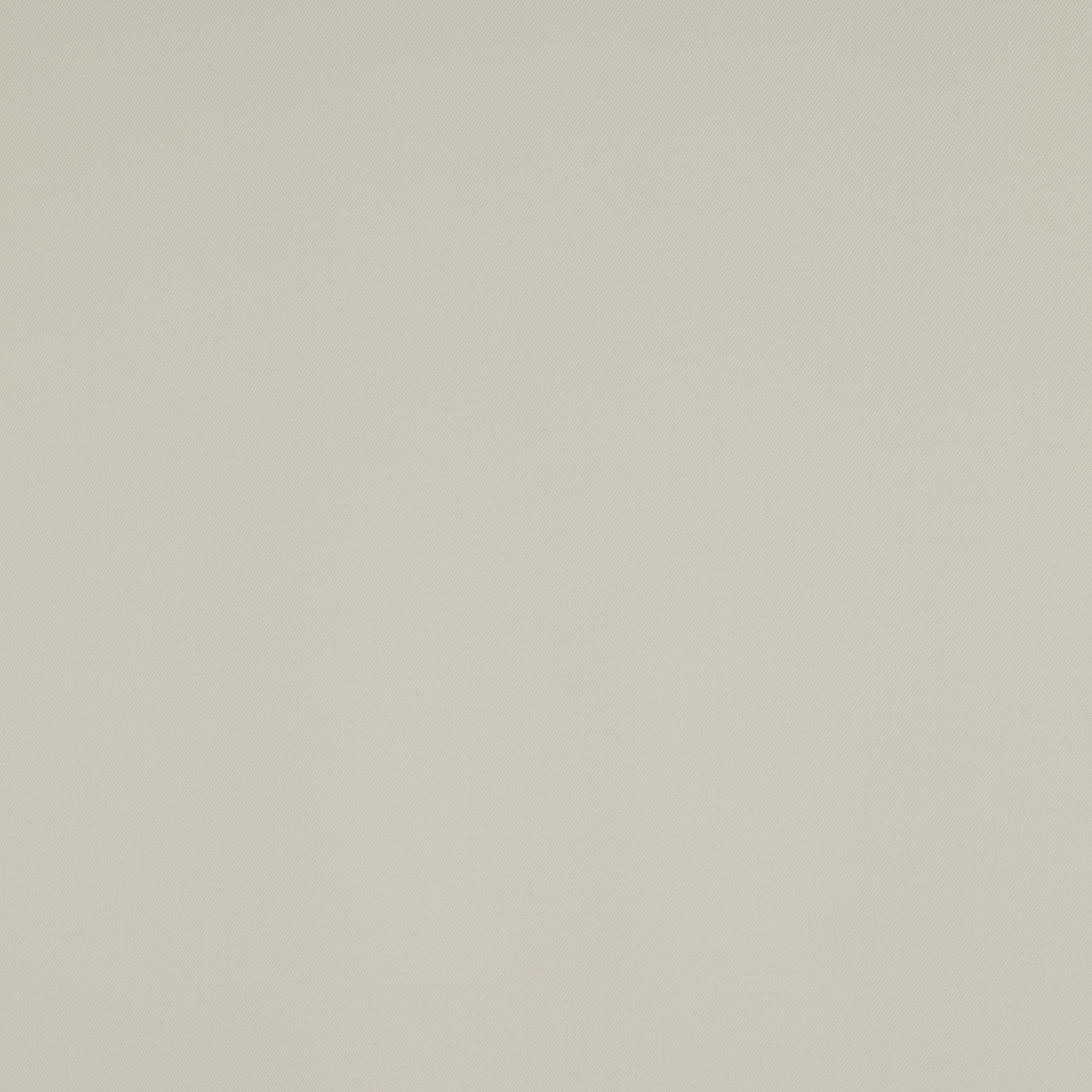 Close-up of a soft ivory plain wool fabric swatch