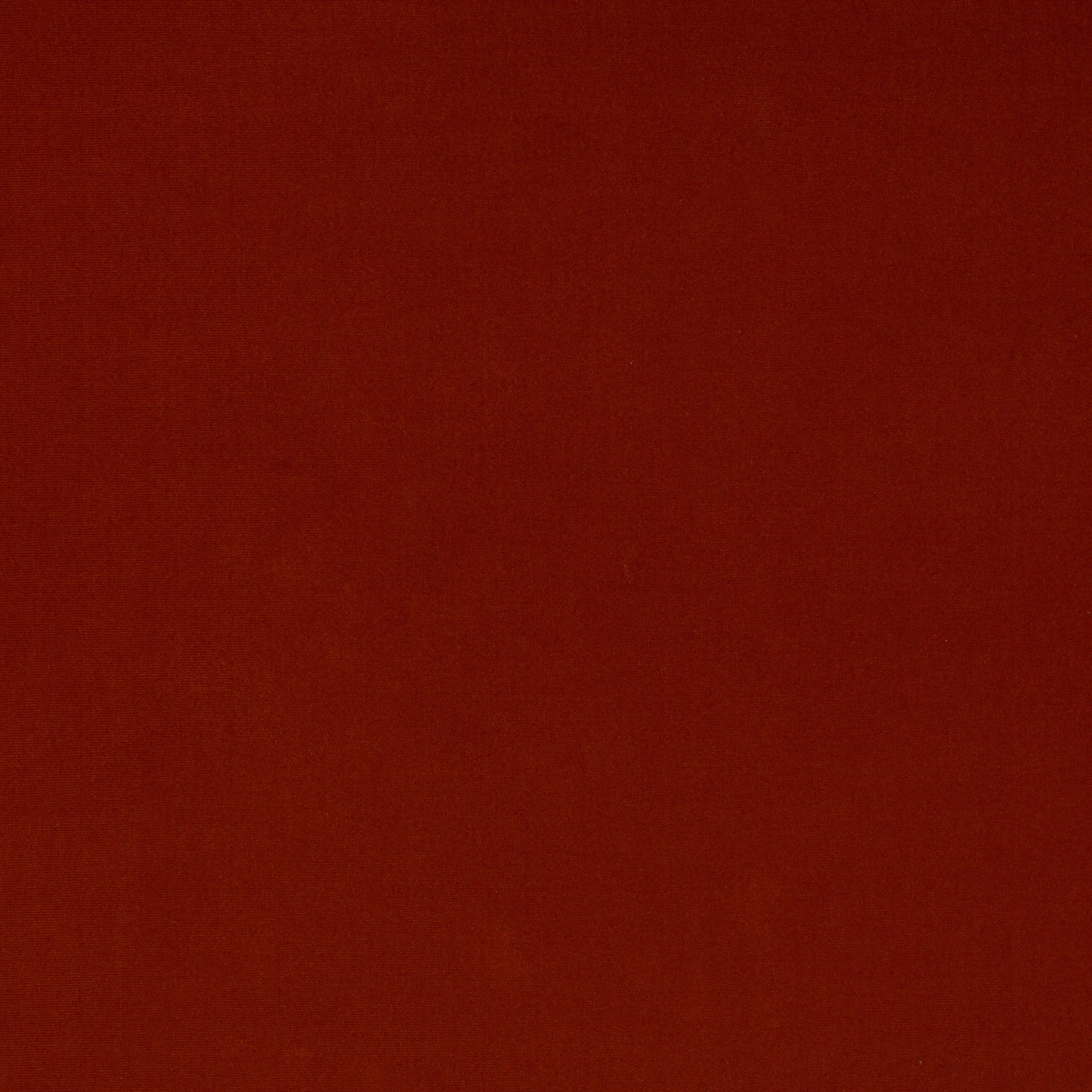 Deep burnt orange velvet swatch with a soft directional sheen