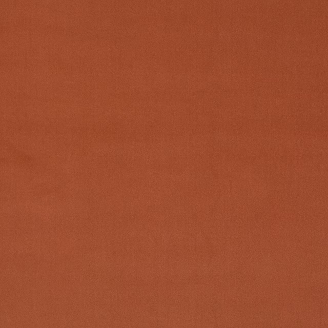 Warm coral terracotta plain velvet swatch with a soft lustre