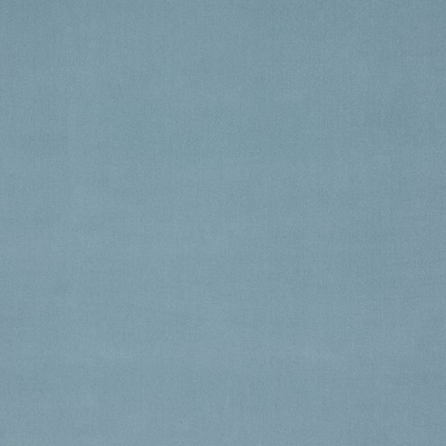 Smooth dusty blue cotton velvet swatch with a soft matte sheen