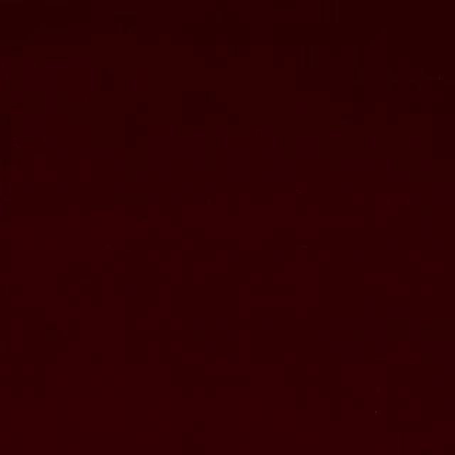 Deep ruby red plain velvet swatch with a soft, dense pile