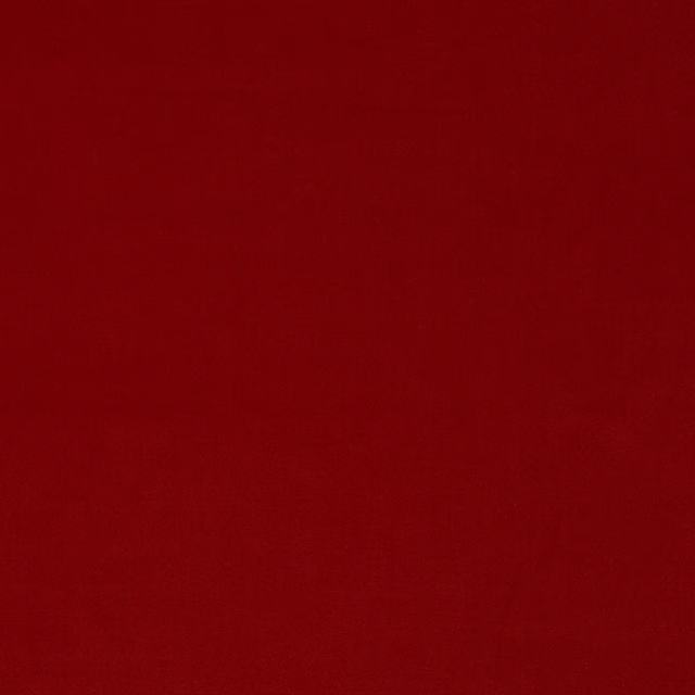 Deep tomato red cotton velvet swatch with a plush, even pile