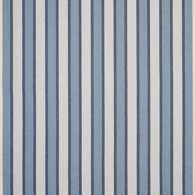 Vertical indigo and pale blue striped fabric with a fine woven texture