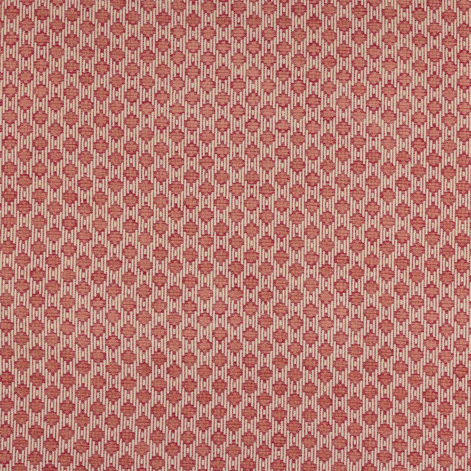 Small geometric fabric swatch in muted red, blush and cream