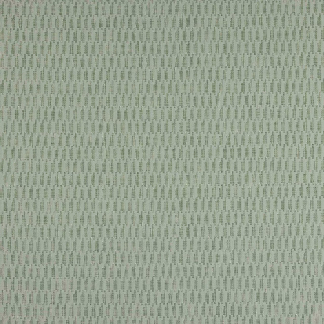 Soft sage green woven fabric with a small repeating textured pattern