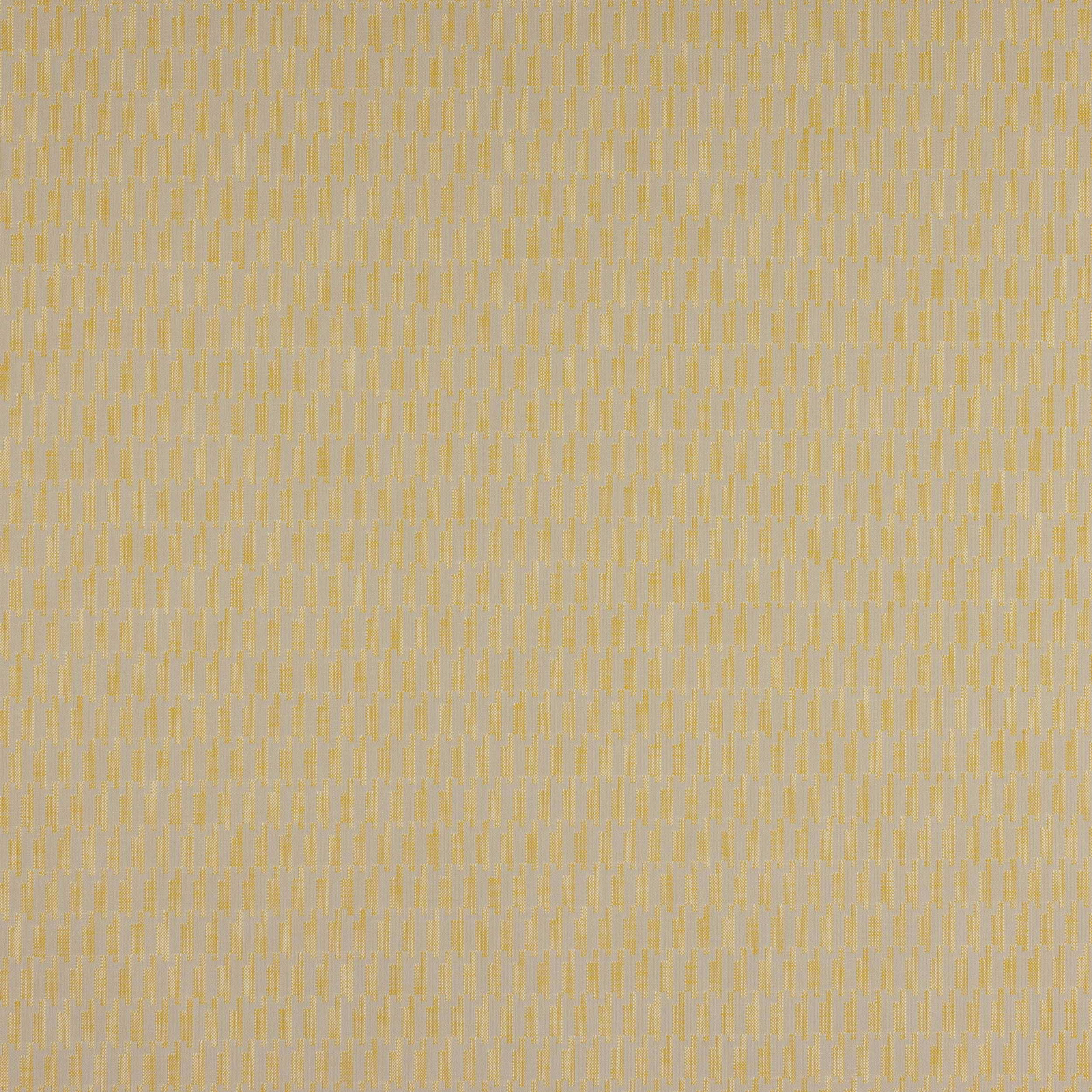 Close-up of a pale buttery yellow woven fabric with a small textured pattern