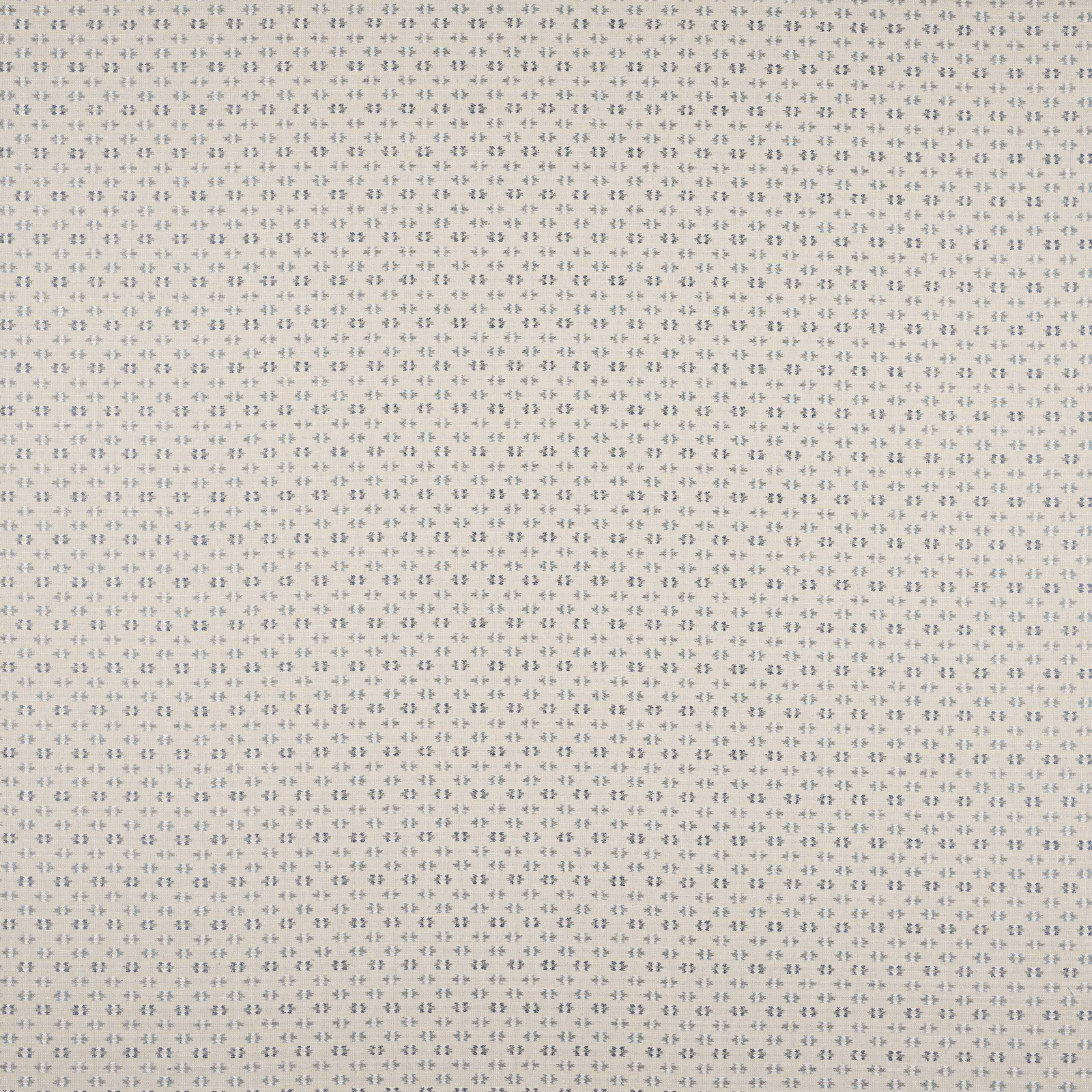 Small blue repeating motif on a warm cream woven fabric swatch