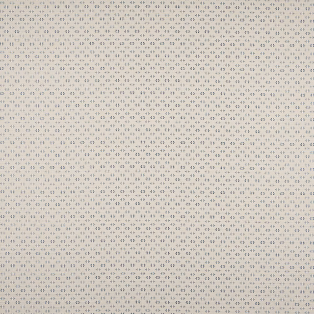 Small blue repeating motif on a warm cream woven fabric swatch
