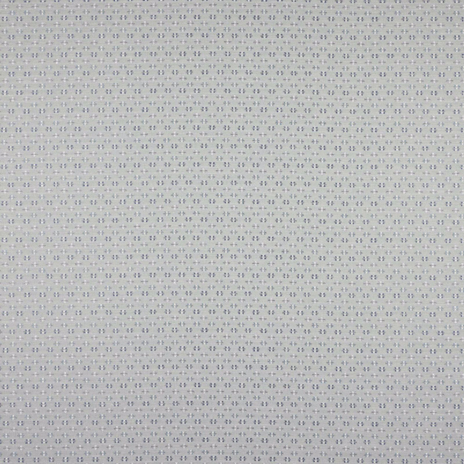 Soft washed blue fabric with tiny dotted woven pattern and subtle linen texture