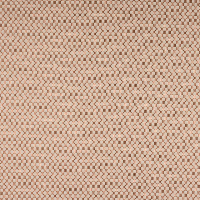 Close-up of Radnor Red Denbury fabric showing a small red geometric lattice on a pale ground.