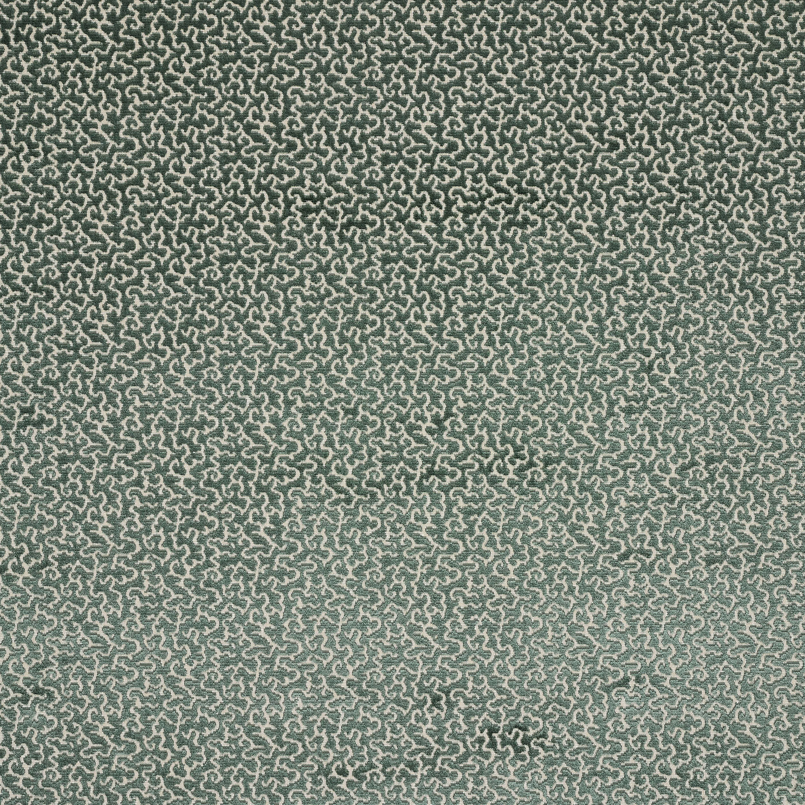 Soft sage green woven fabric with a small scrolling textured motif