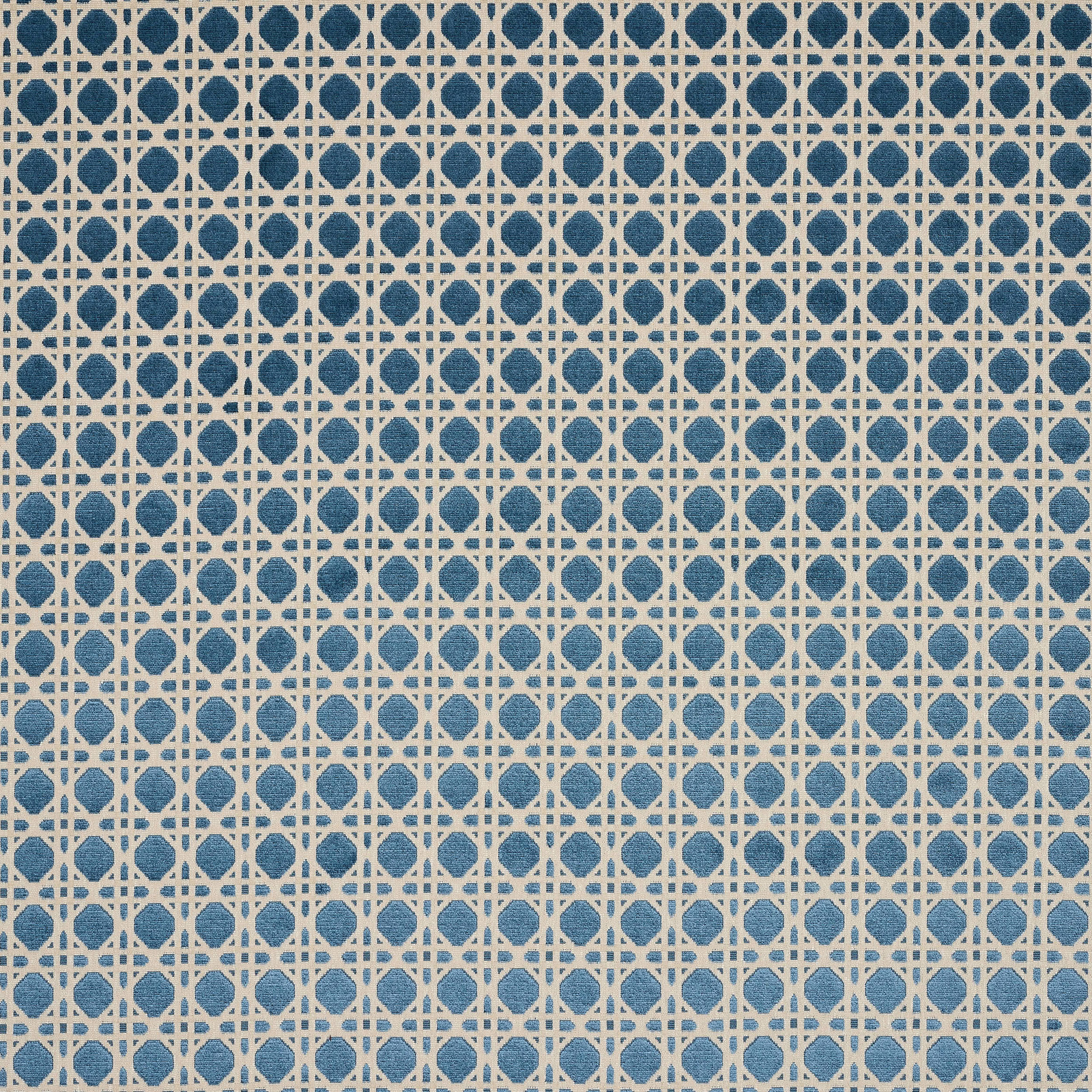 Blue geometric lattice fabric on a pale ground, small-scale repeating motif