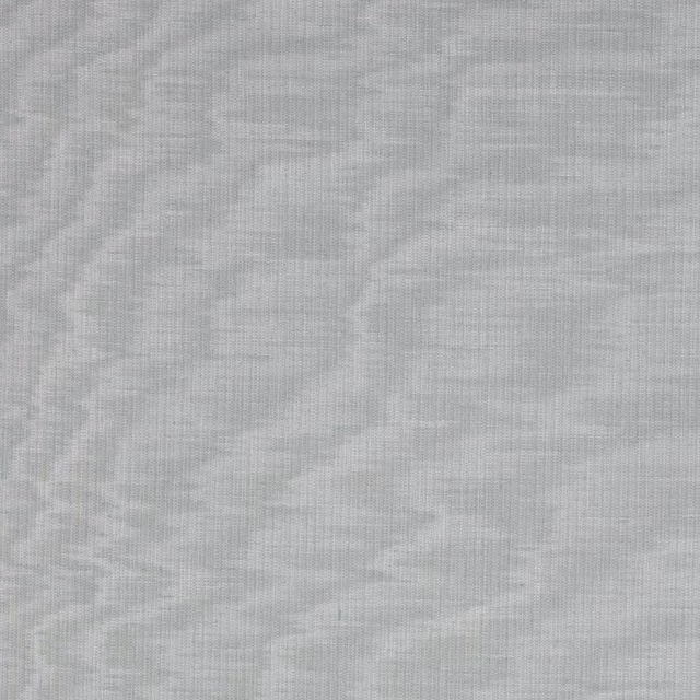 Soft powder blue plain fabric with fine woven texture and gentle slub