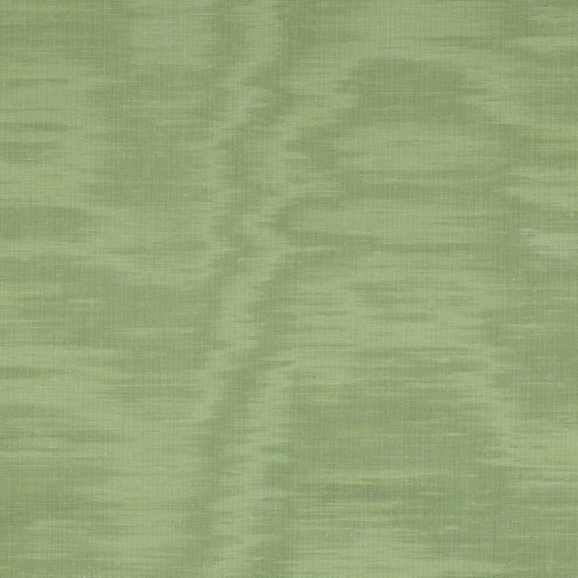 Soft sage green plain fabric with subtle slubbed texture and gentle sheen