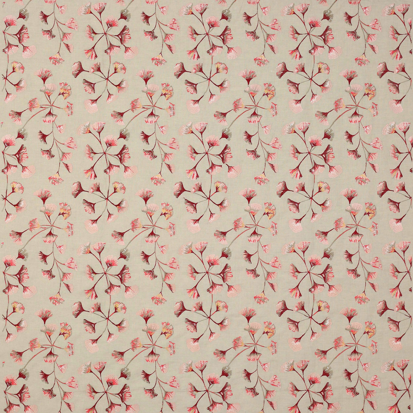 Pink and red ginkgo leaf motif on a soft blush woven fabric swatch